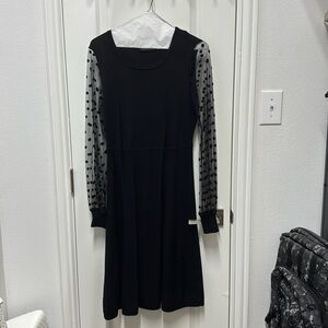 Black dress with mesh sleeves